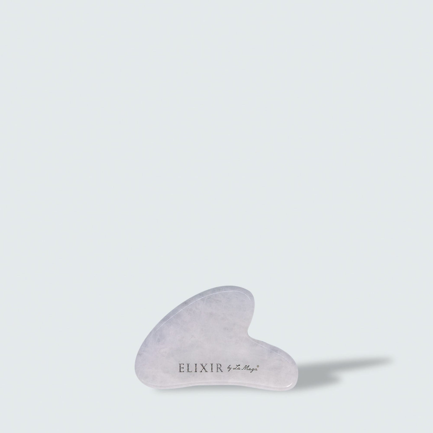 Gua Sha: piedra de belleza para masaje facial de Elixir - Elixir by La Maga